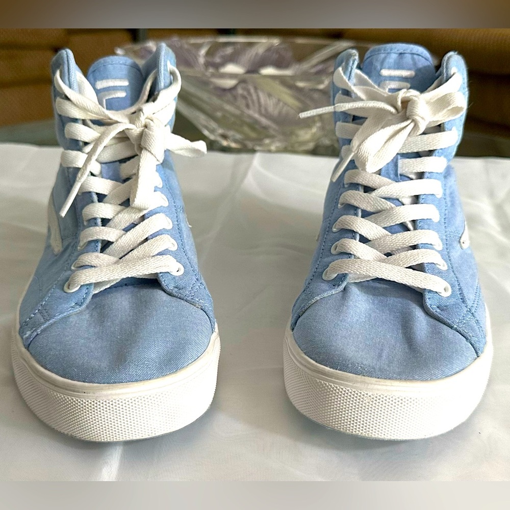 Blue high top denim look canvas Fila sneakers.